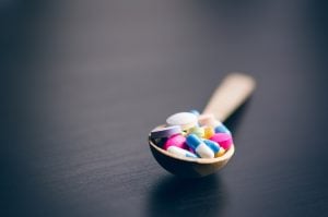 pills-in-spoon