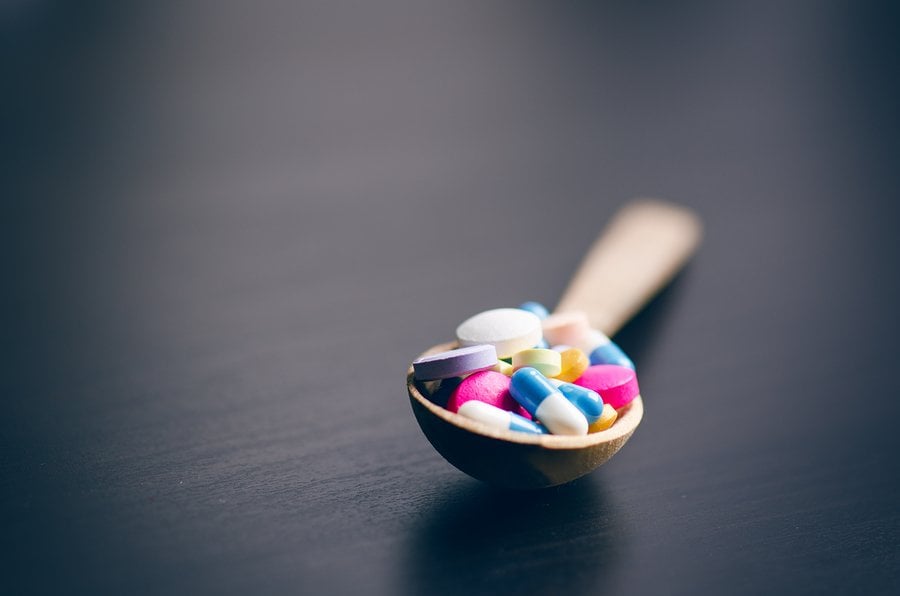 pills-in-spoon