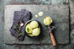 Green Tea Ice Cream With Mint Leaves And Spoon For Ice Cream On